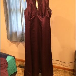 Plum satin bridesmaid dress.