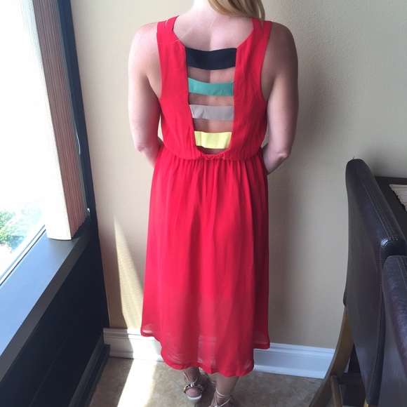 Rasta Red high-low dress with fun back. Size small