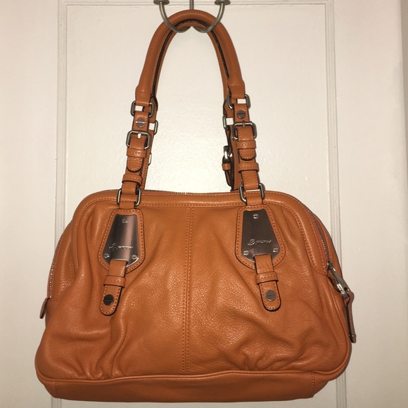 B. Makowsky Orange Three Zip Bag