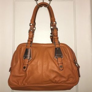 B. Makowsky Orange Three Zip Bag