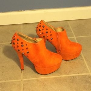 Spiked orange heels