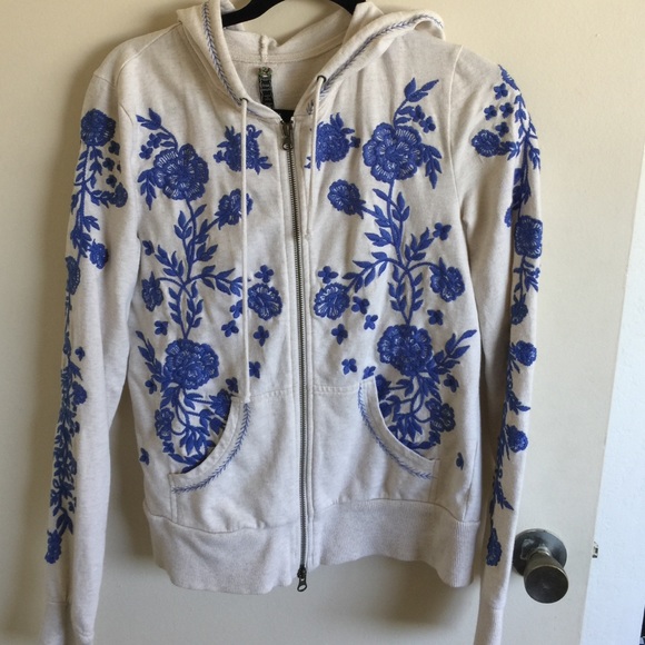 Free people zip up hoodie jacket.