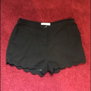 Black scalloped shorts