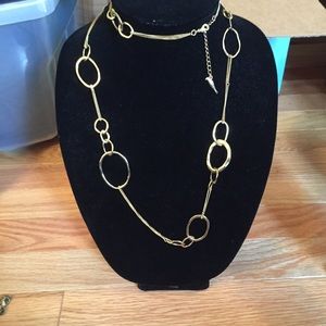 Long gold necklace