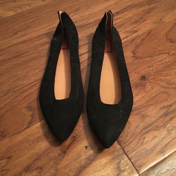 Black flats with gold studs on back