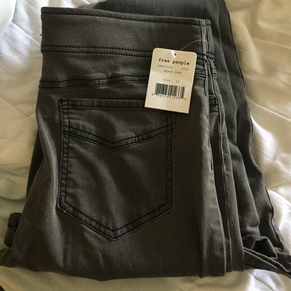 NWT. Size 31. Free People Black Sand Flare Jeans.
