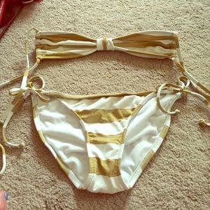 Gold and white bikini.