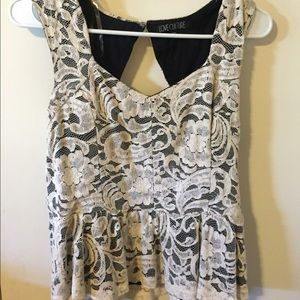 A white and black blouse from love culture