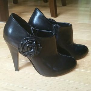 Black zipper booties, lightly worn