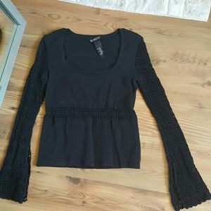 Bebe, never worn sweater, crocheted arms