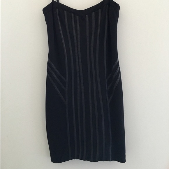bebe Dresses & Skirts - NWOT Bebe tight dress with leather strips.
