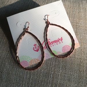 Rose gold colored earrings