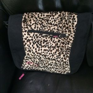 Jansport messenger bag- cheetah print front flap.