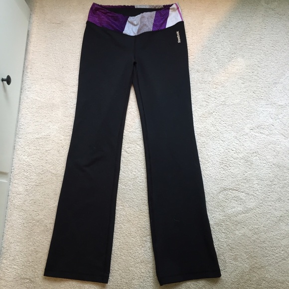 Black reebok yoga pants with purple band