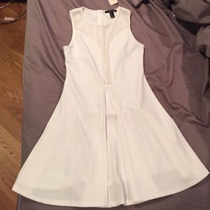Plunging next white dress