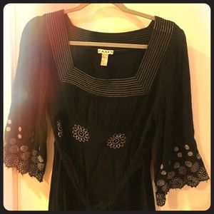 Black dress with white embroidery