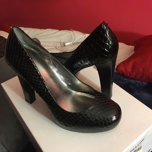 Black Calvin Klein pumps