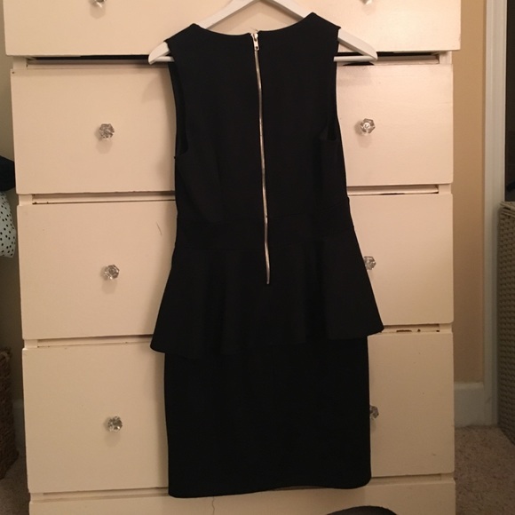 Flattering black peplum dress - Picture 2 of 3