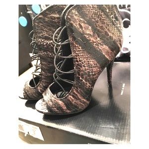 Snake printed open toe heels