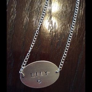 Hand made metal stamped necklace.