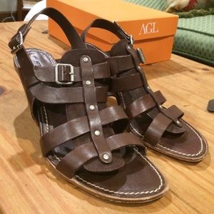 Brown sandal with small silver buckle
