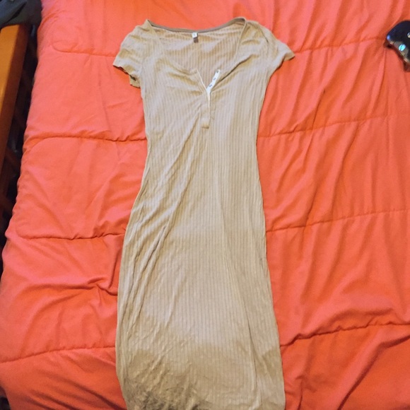 BodyCon Tan dress. Snap button front.