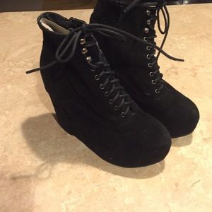 Black wedge heel boots