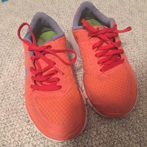NIKE bright orange with purple size 5.5