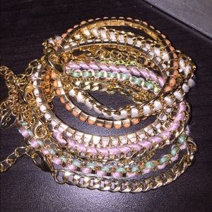 Gold bracelet set with pastel accents