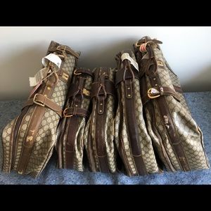 A lot of 8 vintage Gucci and Dior suitcases