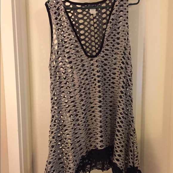 2X gray and black cut out tank top.