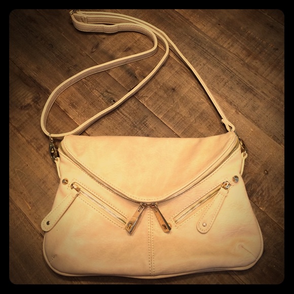 Boutique tan cross body.