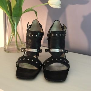 Michael Kors black leather studded heel.