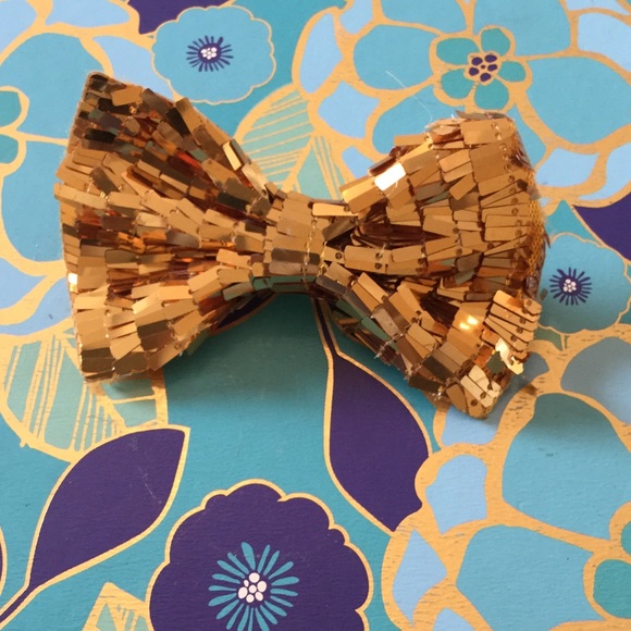 Cute shiny gold bow
