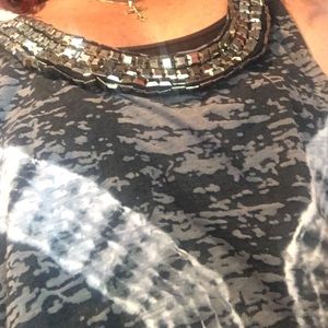 Embellished tank