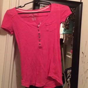 a pink t-shirt