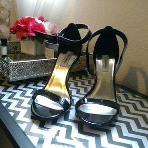 Strappy patent leather heels