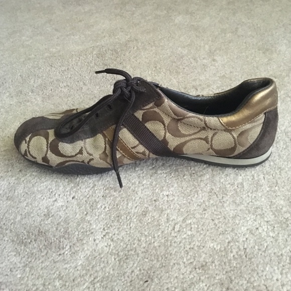 Brown gym shoes. Gold accent. Used. No rips/tears - Picture 2 of 4