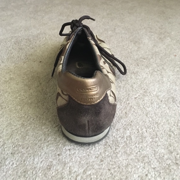 Brown gym shoes. Gold accent. Used. No rips/tears - Picture 3 of 4