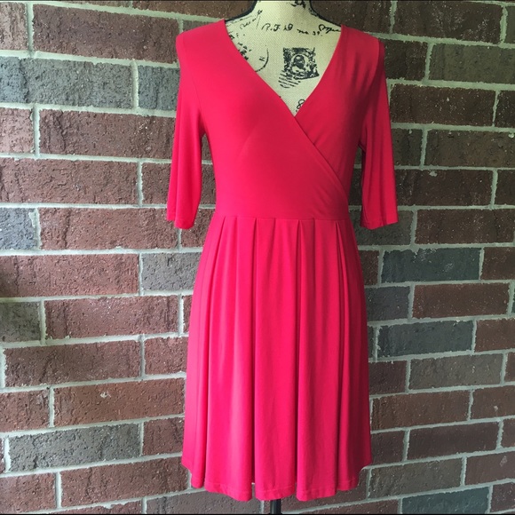 Red pleated v-neck dress