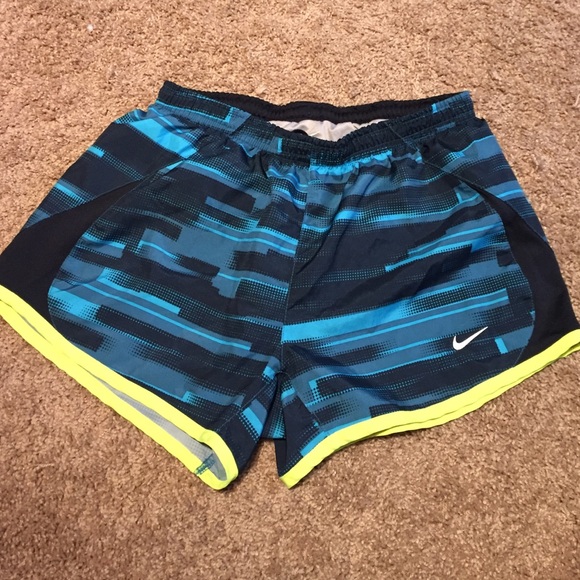 Blue nike running shorts.