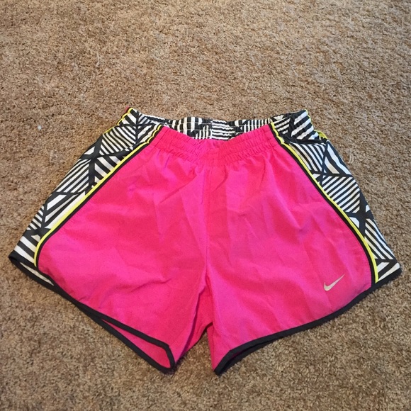 Pink nike running shorts.