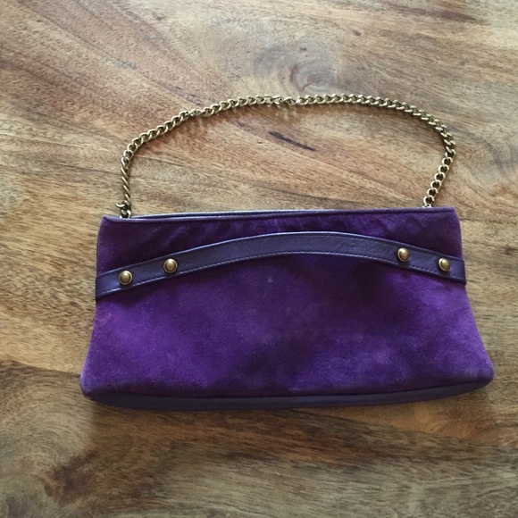 Independent designer. Modern purple clutch.