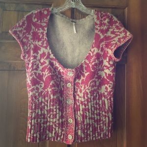 Free People cropped short-sleeved cardigan.