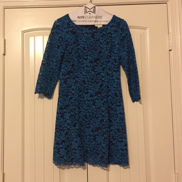 Black dress with blue lace overlay. Worn once.