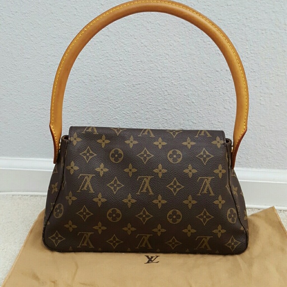 Louis Vuitton - Picture 2 of 4