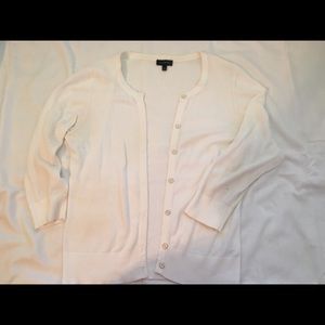 The Limited White Cardigan with gold buttons