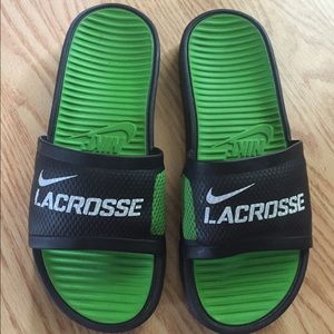 Never worn green lacrosse Nike slides