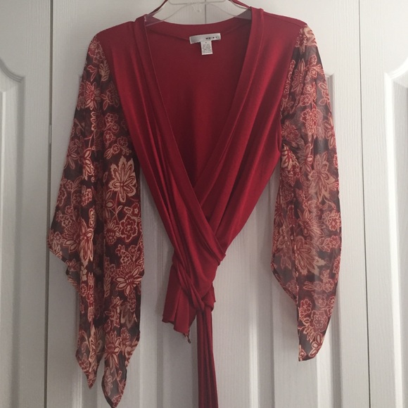 Red wrap shirt with ornate sleeves