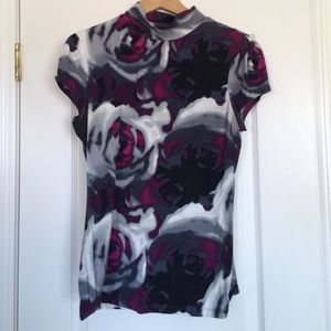 Cute turtle neck short sleeve top!